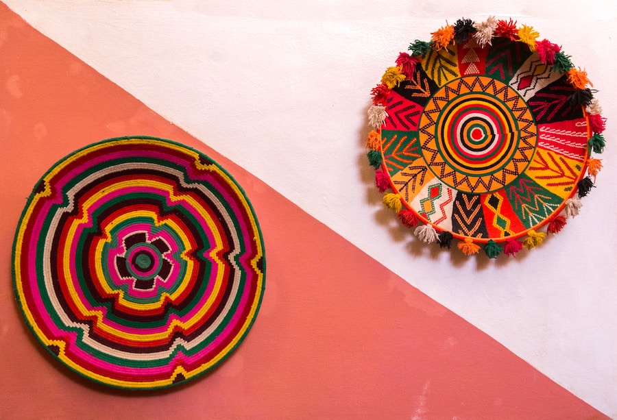 two woven pieces on a wall, demonstrating High-End Interior Design