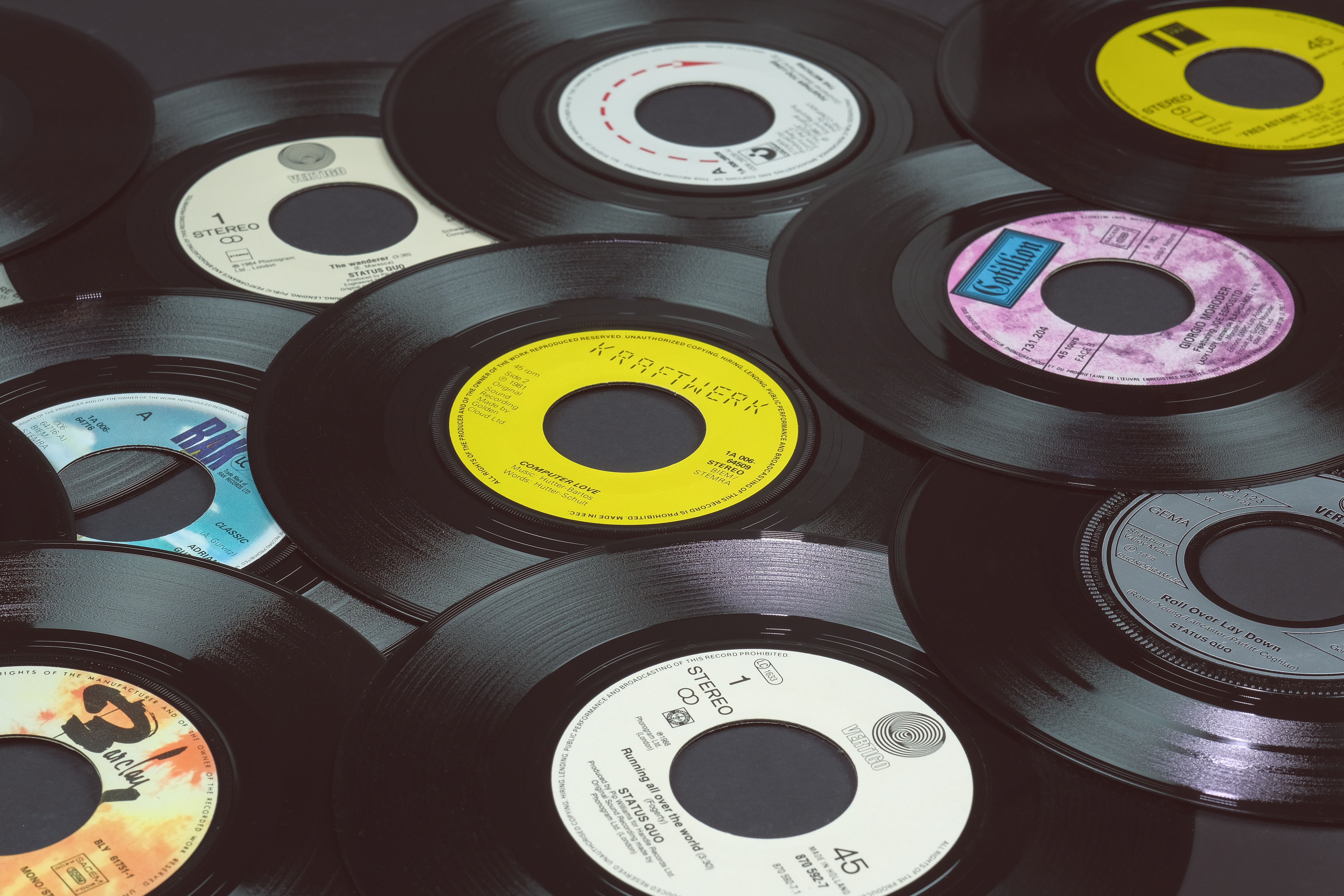a number of Vinyl Records without their covers